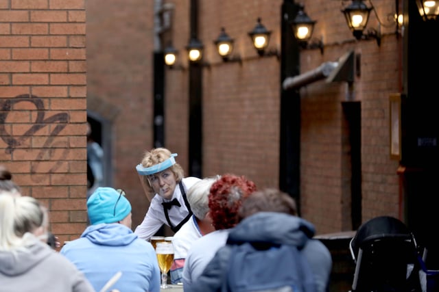People in Belfast city centre as the re-opening of hotels, restaurants and bars across Northern Ireland takes place after