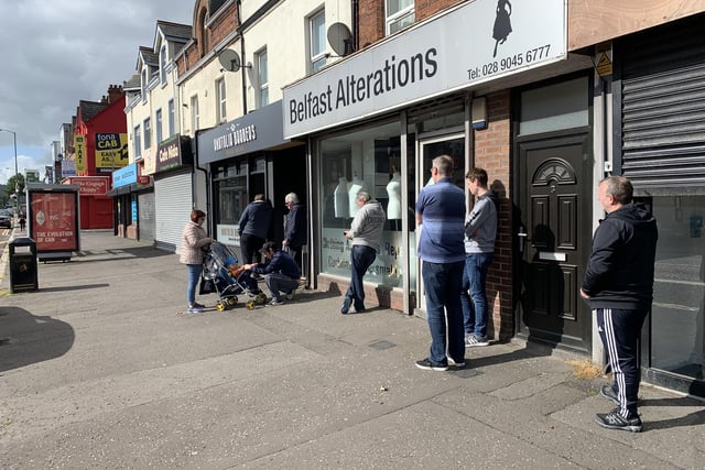 Queues from early morning outside East belfast barbers shops as restrictions were lifted at midnight to allow them to re open
