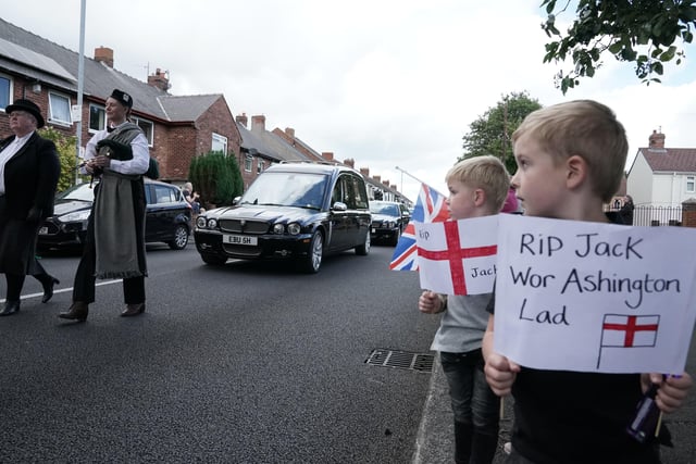 People line the streets as the funeral cortege of Jack Charlton passes through his hometown of Ashington, in Northumberland ahead of his funeral service at West Road Crematorium, in Newcastle