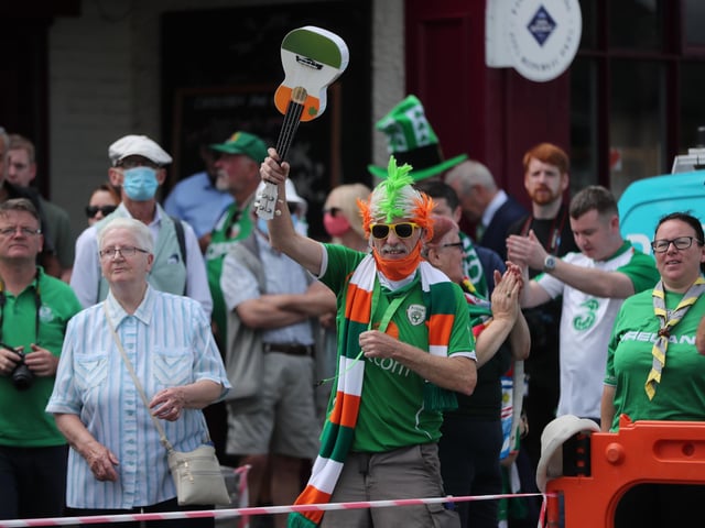 Irish football fans gather at Walkinstown Roundabout, Dublin to celebrate the life of former Republic of Ireland manager Jack Charlton at the same time of funeral in Newcastle