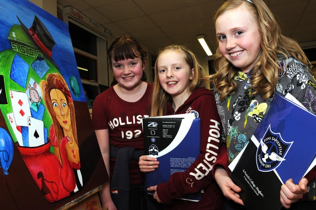 Joanne, Beth and Aiofe viewing some of the art work which was on display at the Open Night at  St. Patrick's College, Maghera.mm03-134ar.
