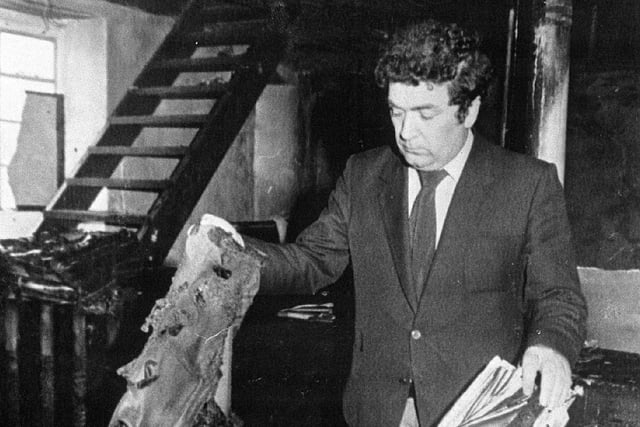 John Hume inside Party HQ in after it was attacked by petro bombers.