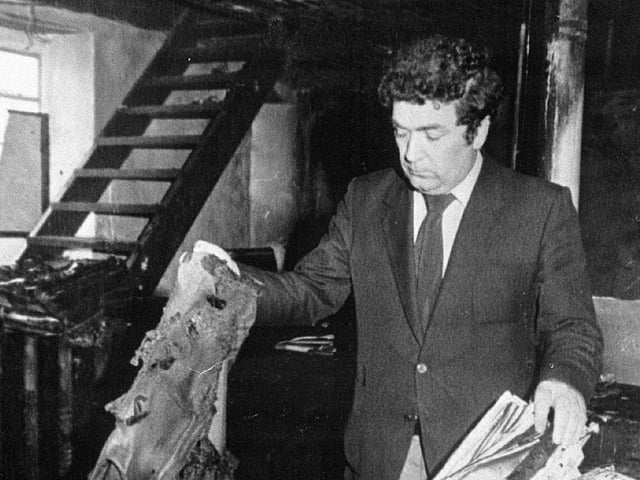 John Hume inside Party HQ in after it was attacked by petro bombers.