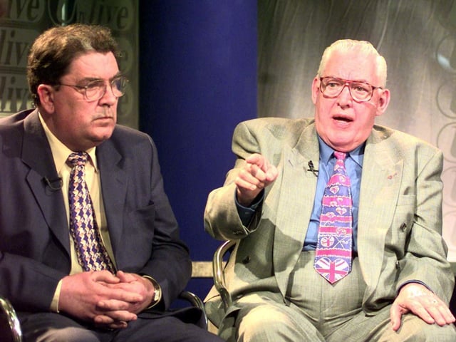 John Hume leader of SDLP (left) and Democratic Unionist Party leader Rev Ian Paisley after the result of the Northern Ireland referendum in Belfast. An overwhelming 71.1 voted Yes