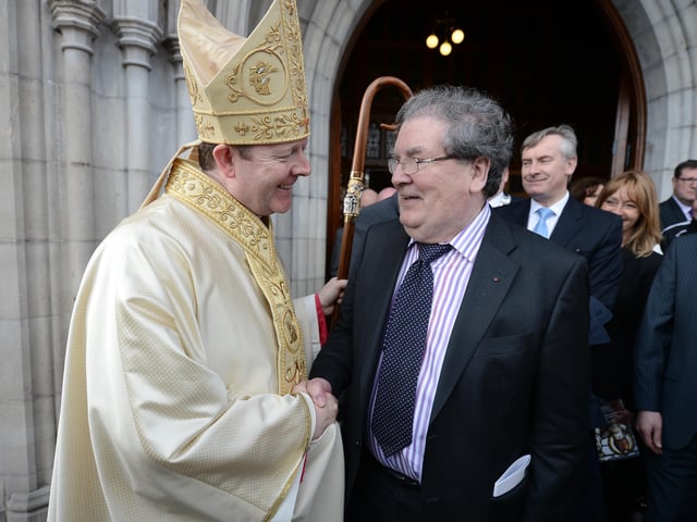 The Episcopal Ordination Mass of Monsignor Eamon Martin as Coadjutor Archbishop of Armagh at St. Patrick's Cathedral, Armagh. Archbishop Martin greets John Hume outside the cathedral after the service