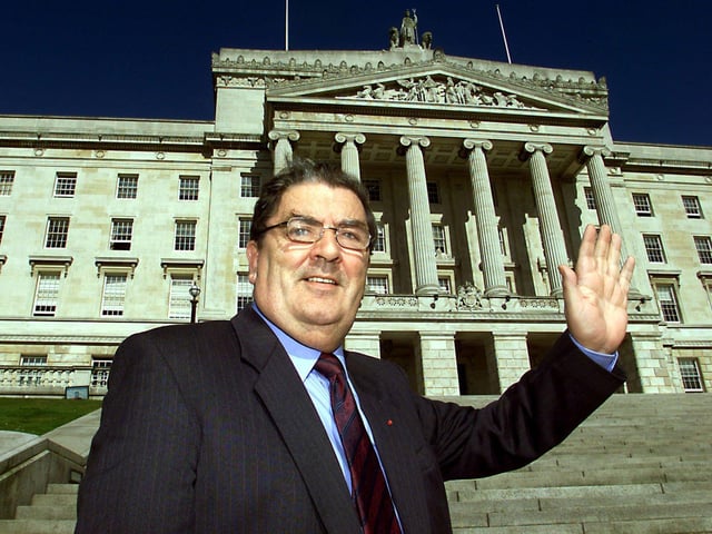 Social Democratic Labour Party's (SDLP) John Hume in front of the Stormont Building near Belfast