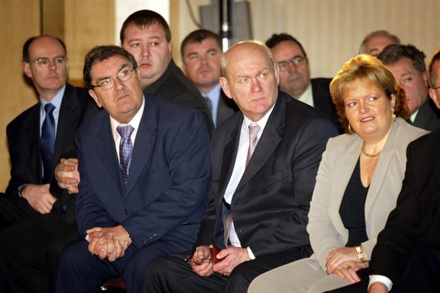 John Hume (second left), former leader of the SDLP, listens with party colleagues as as the party's then leader, Mark Durkan, launches his party's manifesto in Belfast, ahead of the Northern Ireland Assembley elections on November 26, 2003.