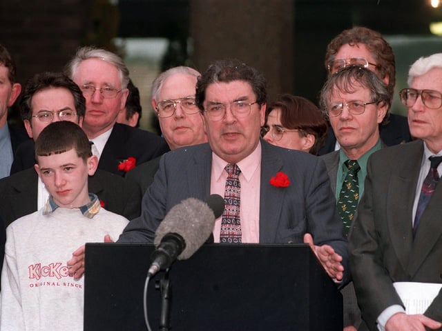 SDLP party leader John Hume and his talks team emerge from Castle Buildings to give their take on the signing of the Good Friday Agreement.
