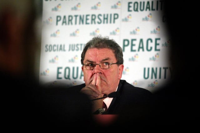 John Hume former leader of the SDLP, listens to Mark Durkan addressing the party's annual conference in Belfast