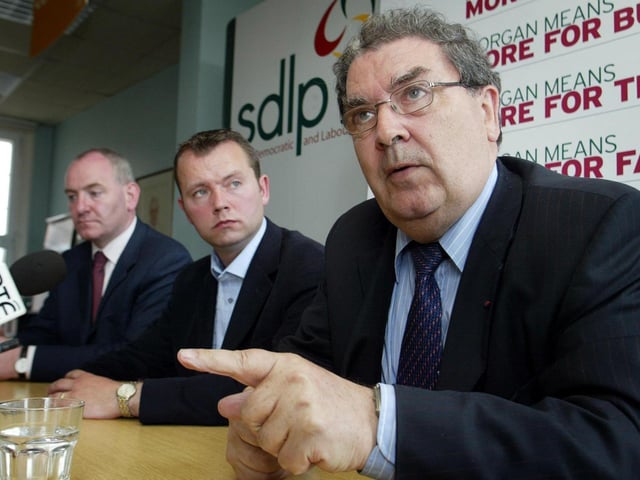 Former SDLP leader and MEP John Hume (right), with SDLP European election candidate Martin Morgan (centre), and party leader Mark Durkan at a party press conference in Belfast.
