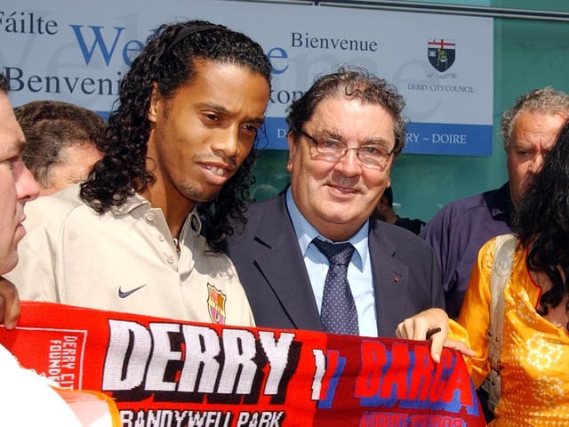 The late John Hume, who was instrumental in bringing Barcelona to Brandywell Stadium, pictured with Ronaldinho who would later make his debut for the Catalans against Derry.