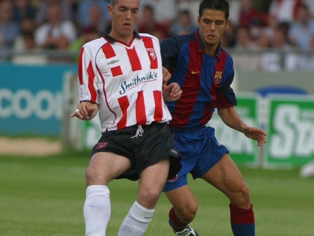 Derry City striker Gary Beckett lays off the ball under pressure during the pre-season friendly at Brandywell Stadium.