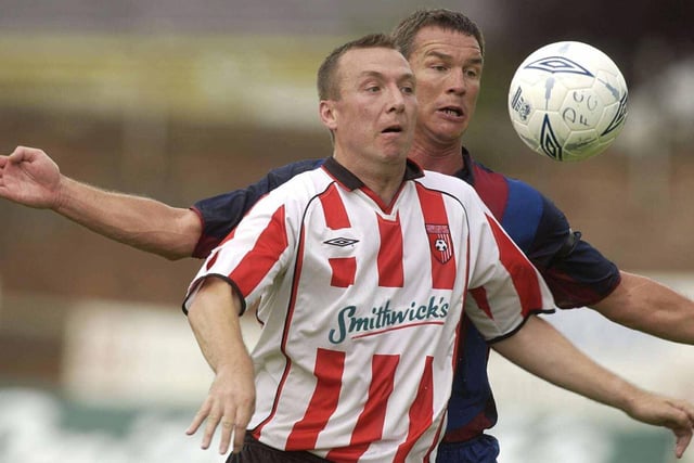 Derry City striker, Liam Coyle holds up the ball under pressure from Barcelona defender Patrick Andersson during the friendly at Brandywell.