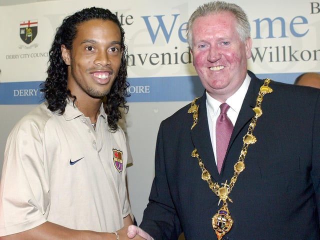 Barcelona star Ronaldinho is greeted by Mayor of Derry, Shaun Gallagher on his arrival with the team ahead of the friendly against Derry City.