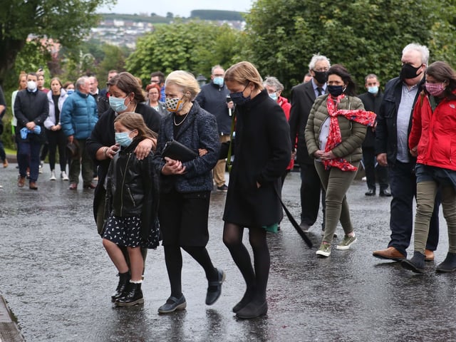 The remains of the late John Hume arriving at St. Eugene's Cathedral