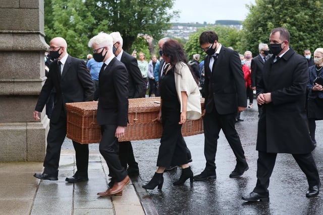 The remains of the late John Hume arriving at St. Eugene's Cathedral