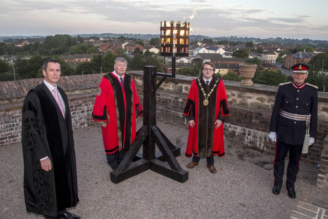 Lisburn and Castlereagh City Council hosted a morning and evening VJ Day event on August 15. In the evening, a beacon was lit by the Mayor Nicholas Trimble and the Lord Lieutenant of County Antrim, Mr David McCorkell. Also included are Alderman Paul Porter, Corporate Services Committee Chairman and Council Chief Executive David Burns.Pic Steven McAuley/McAuley Multimedia