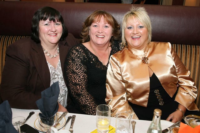 Glamorous sisters at the Pomeroy dinner - Collette McNamee, Laura Rafferty and Nuala McCaffrey. TT4707-168JS