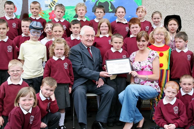 William McLaughlin presents a cheque for £710 to Gill Moffett and Malachy Loughrin of Diabetes UK N.I. on behalf of the pupils of Queen Elizabetn II PS Pomeroy.  TT26-753MPC