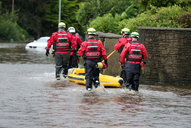 Emergency services attend flooding in Bryansford Avenue Newcastle.

Heavy downpours and flooding this morning have caused disruption across Northern Ireland.