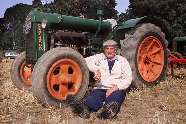 Taking it handy is John Purdy from Newtownards with his 1940 2 Fordson Tractor in August 2002. Picture: Mark McCormick/News Letter archives