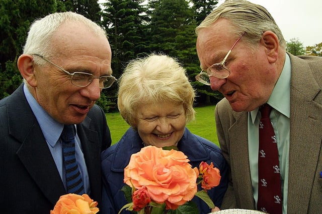 Pictured in July 2002 is the judging of the International Rose Trials at Sir Thomas and Lady Dixon Park for the R J Frizzell Award, is Garvin Loughrin (Northern Ireland Tourist Board), Councillor Margaret Crooks and John Mattock  (vice president, Royal National Rose Society) who accepted the award on behalf of winner Gareth Fryer. Picture: Paul Moane/News Letter archives