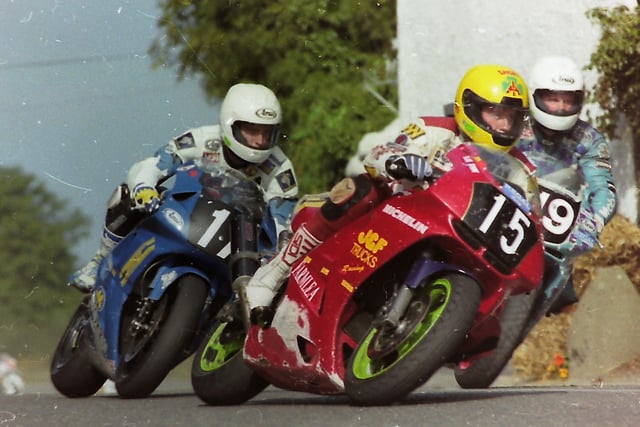 Adrian Archibald (19) in the slipstream of Alan Irwin (15) during the Junior Open race at the Carrowdore 100 in September 1996. Picture: Bob Hamilton