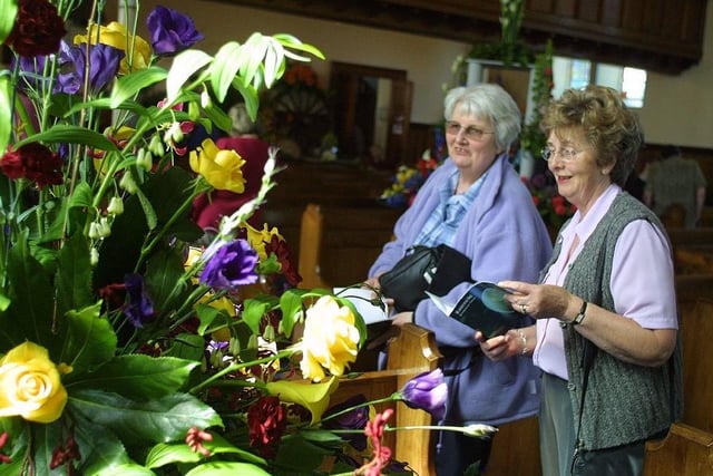 All the way from Islandmagee, Co Antrim, to mark the  he 250th celebration of Roseyards Presbyterian Church, Ballymoney, Co Antrim,  in May 2002, are Jean Kane and Dorrie McIlwaine. Picture: Kevin McAuley/News Letter archives