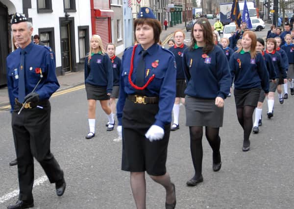 Stepping out at the parade after the Remembrance Day Service at St. Swithen's Church, Magherafelt, last Sunday.mm46-199ar.