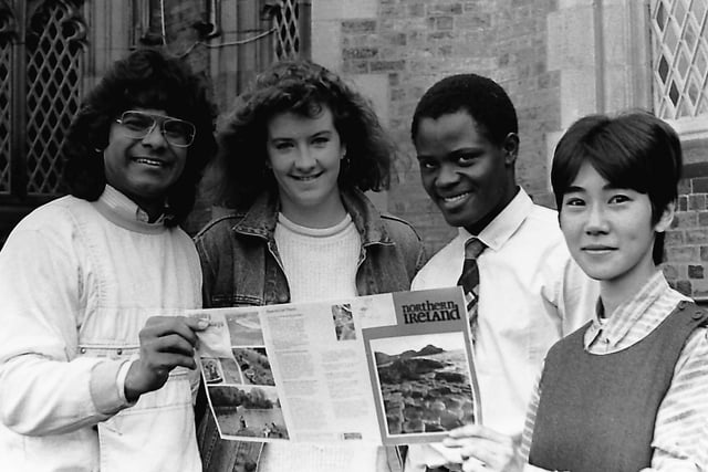 In October 1987 Queen's rolled out the red carpet for that year's intake of 200 foreign students. The overseas students were guests of honour at a special two day welcoming programme, hosted by the university, aimed at giving them the chance to familiarise themselves with their new academic surroundings. Pictured induction programme and reception are, from left, Larry Hilarian, Singapore, Carolyn Yelvington, USA, James Yhamaibhi, Nigeria, and Sugio Harada, Japan. Picture: News Letter archives