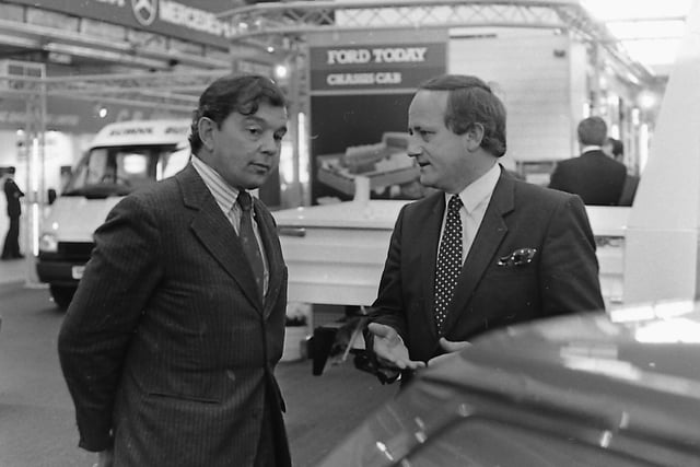 Official visitor: Minister of State Lord Lyell, seen here left, chatting to Mr David Butcher, regional manager of Ford, after opening Northern Ireland's first Commercial Motor Show which was held at the King's Hall in October 1987. Picture: News Letter archives