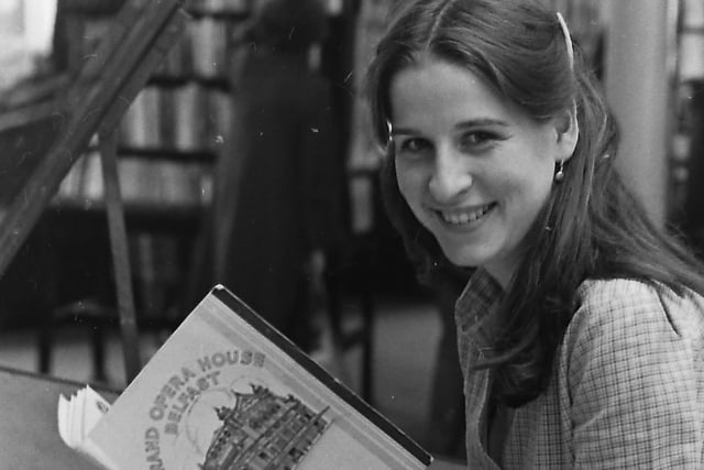 Marie Elliman, 19, from Belfast, a library assistant in Belfast’s Linen Hall Library, with a Grand Opera House, souvenir programme 1895-1945 in a exhibition of 20th century Ulster theatre, which opened at the library in September 1980. Picture: News Letter archives