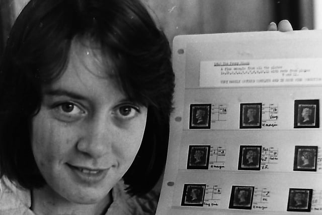 Twenty year old Christine Campbell, who worked in the Belfast Stamp Shop, with a complete run of Penny Blacks Plate 1-11, date 1840, worth £3,500, which were on display at the annual Stamp and Coin Fair at Maysfield Leisure Centre, Belfast, in September 1980. Picture: News Letter archives