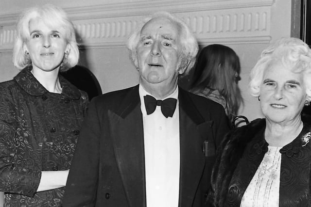 Ulster actor, Joe Tomelty, arrives for the re-opening of the Grand Opera House in September 1980, with his wife and daughter. Picture: News Letter archives