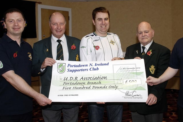 Members of the Portadown Northern Ireland Supporters’ Club presented a cheque for £500 to the Portadown UDR Association in aid of the UDR Association’s memorial window fund in 2010. From left to right are William Dunne (Portadown NISC treasurer), Kenny Carroll (Portadown UDR Association president), Alan Curran (Portadown NISC chairman), Bobby Todd (Portadown UDR Association) and Kyle Quinn (Portadown NISC secretary)