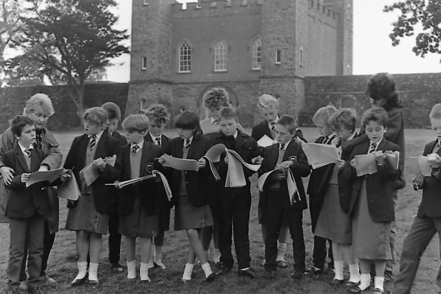Pupils from Forthbridge School, Crumlin Road, Belfast, and their teachers Mrs Margaret Riddels and Mrs Many Pentland visiting the historic Hillsborough Fort built in 1650 to protect the road to Dublin which passed through the town. The trip, in October 1987, was to help the children with their history, geography and English lessons. Picure: News Letter archives