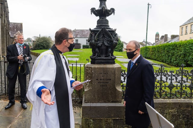 Taoiseach Micheal Martin is welcomed to St Macartin's Cathedral, Enniskillen by Dean Kenneth Hall.  Picture: Ronan McGrade