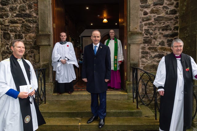 Taoiseach Micheal Martin is welcomed to St Macartin's Cathedral, Enniskillen by Dean Kenneth Hall.  Picture: Ronan McGrade
