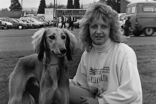 Cheryl Harkness of Newtownards with Tulatis Peblu, the Saluki, owned by Granville Francis of Newtownards, at the Belfast dog championships at Balmoral in October 1989. Picture: News Letter archives