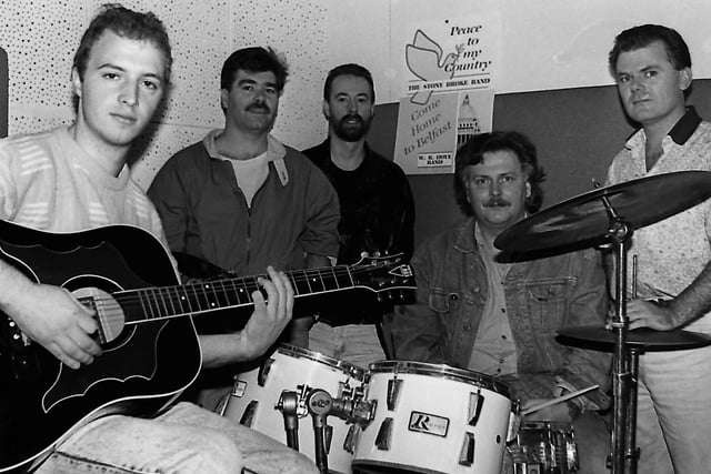 Pictured in October 1989 is a talented quintet who were involved with the Shankill Musicians' Collective and only to happen to impart their skills to young hopefuls. And right, Alan Williamson at the controls of the 24-channel, 16-track recording deck – the latest model on the market. Fundraiser Nina Wardle told the News Letter: “It is terribly important thing for children. With cutbacks in the education and library boards we are helping fill a gap. It is every kid's dream to have equipment like this to use and we would appeal for funds to keep going.” Picture: News Letter archives
