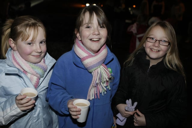 JUST GIRLS. Laura, Jane and Ellie, who were pictured at the Christmas tree lights switch on in Cloughmills on Monday night