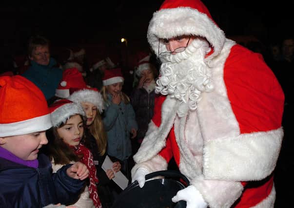 Santa Claus who made a surprise visit to Tobermore Christmas lights switch on last Saturday night
