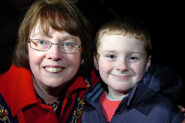 Magherafelt District Council Chairperson Anne Forde pictured with Harry Wallace at the Tobermore Christmas lights switch on last Saturday night.