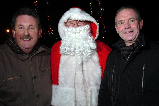 Santa Claus pictured with Brian Scott (Chairperson of Tobermore Community Projects) and David Henderson (MD of Tobermore Concrete) at the Tobermore Christmas lights switch on last Saturday night