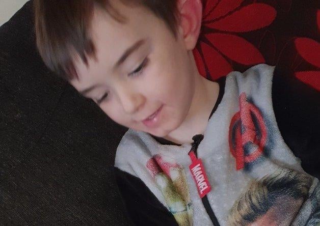 Four-year-old Eli McGuigan working on his letter for Santa.