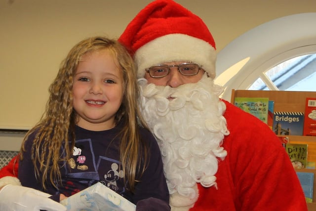 Aileen MacFarlane with Santa during his visit to the Gracehill After Schools Club
