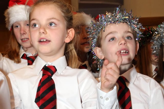 Darcy Jones and Rebecca Parks of Carnmoney Primary School sing Santa Baby to the packed audience in Carnmoney Presbyterian Church