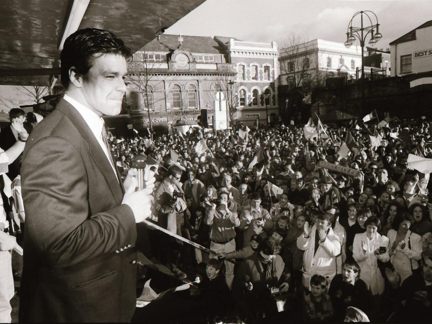 Derry City skipper, Dermot O'Neill addresses the large crowd who arrived at Guildhall Square to celebrate the club's FAI Cup success in 1995.
