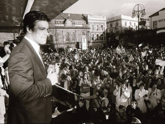 Derry City skipper, Dermot O'Neill addresses the large crowd who arrived at Guildhall Square to celebrate the club's FAI Cup success in 1995.