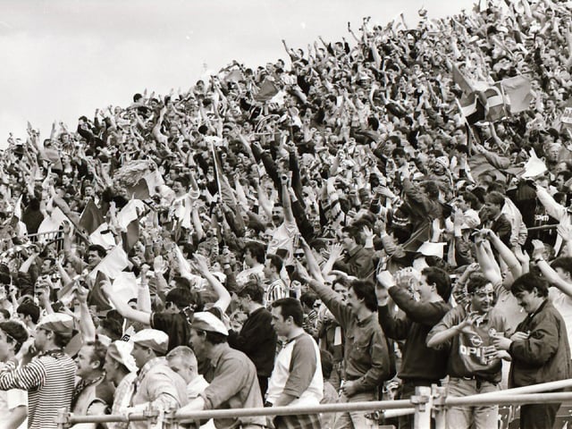 Recognise anyone? These Derry City fans are in fine voice as they roar their team on to victory over Shelbourne in the 1994/95 FAI Cup Final.
